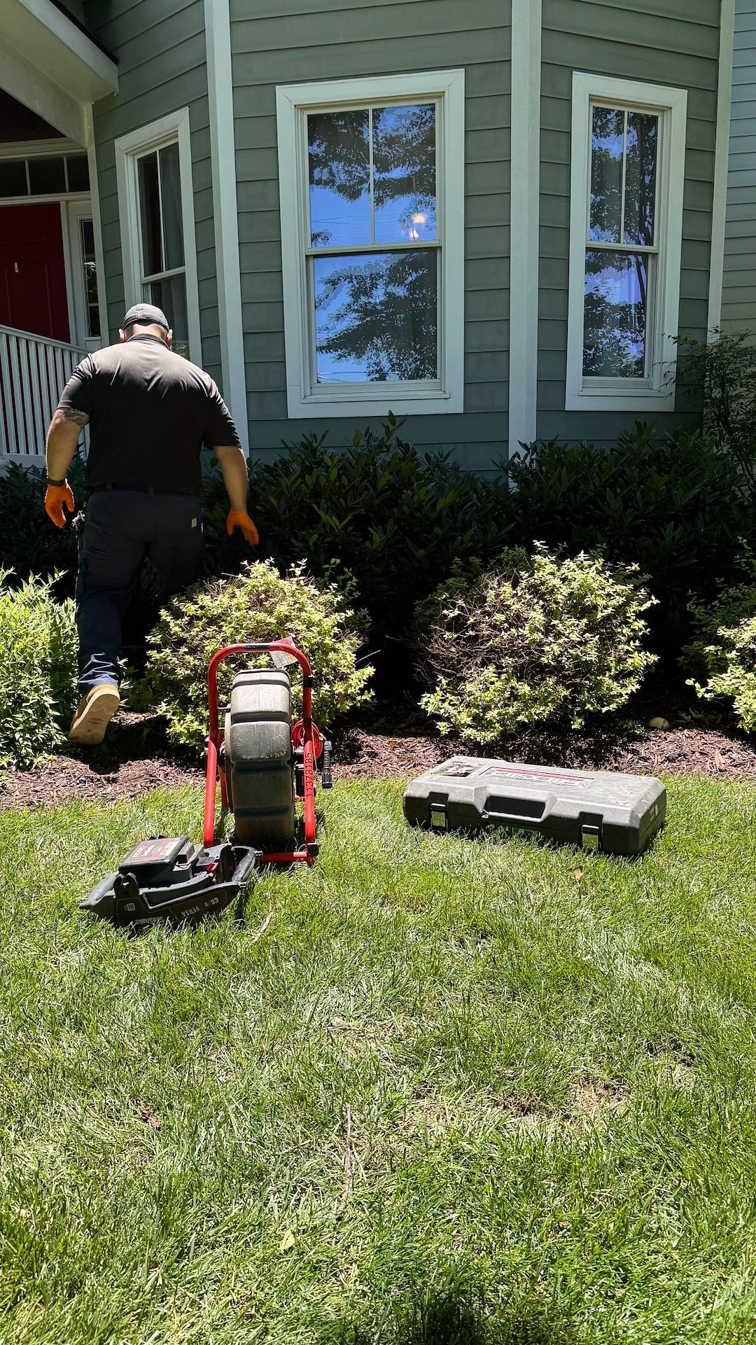 Peregrina Plumbing technician running a sewer camera to a home's sewer line in Alexandria, VA